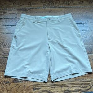 Men’s tan Footjoy golf Shorts.  Size 34. Flat Front Polyester Spandex